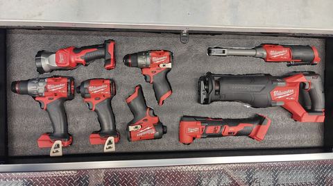 Foam drawer of Milwaukee M12 and M18 cordless tools: hammer drills, impact drivers, ratchet, Sawzall, multi-tool, and work light